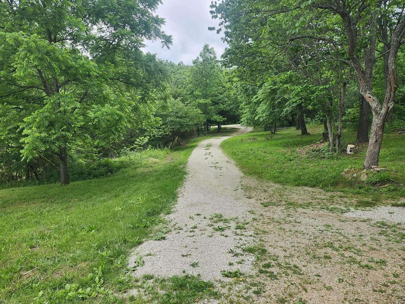 11.2 Acres of Land with Home for Sale in Mountain Grove, Missouri