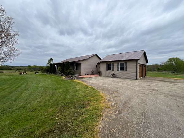 35 Acres of Land with Home for Sale in Cochranton, Pennsylvania
