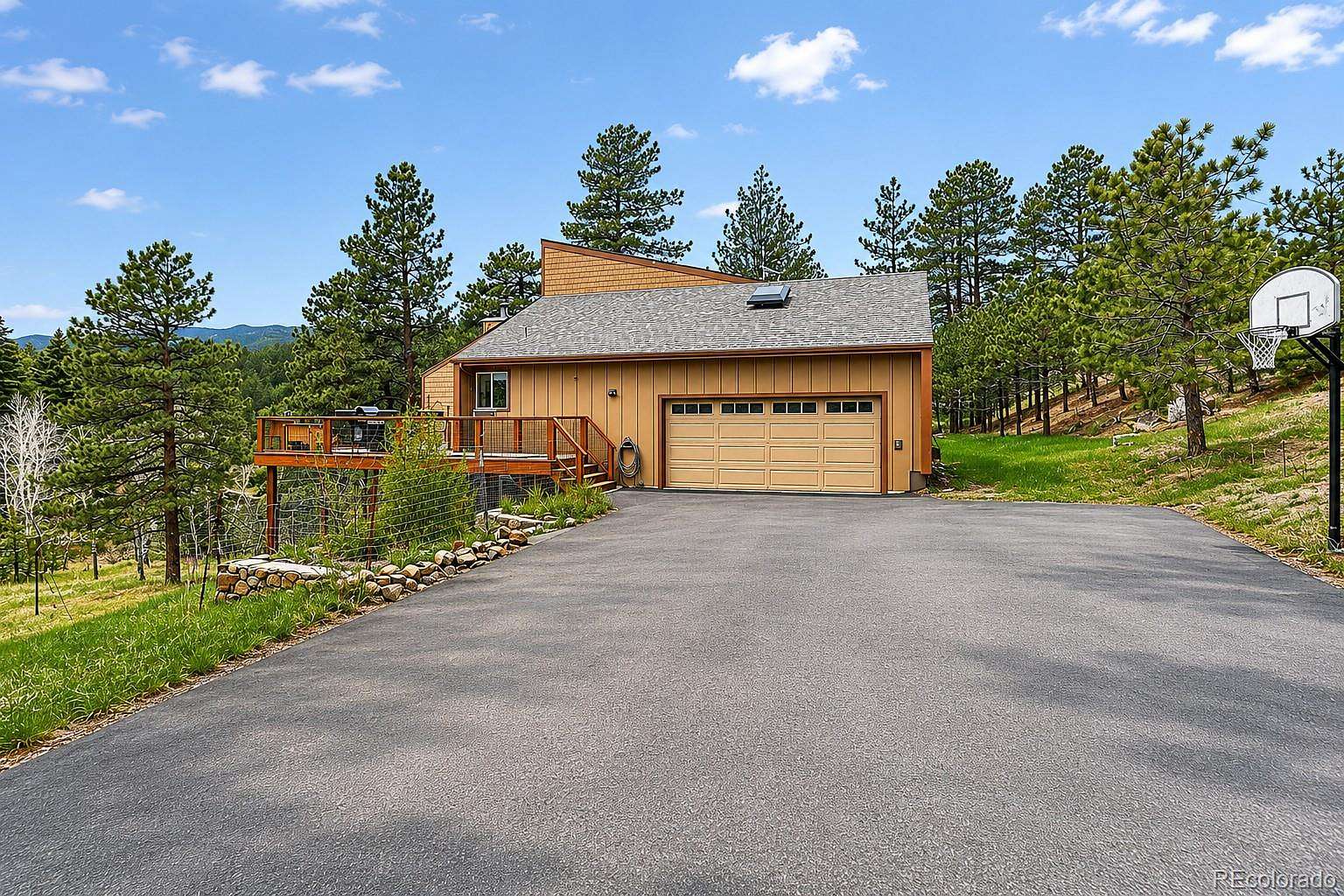2 Acres of Land with Home for Sale in Evergreen, Colorado