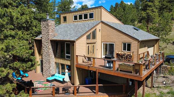 2 Acres of Land with Home for Sale in Evergreen, Colorado