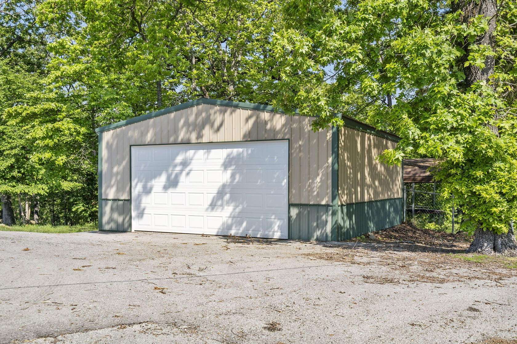 1.55 Acres of Land with Home for Sale in Shell Knob, Missouri
