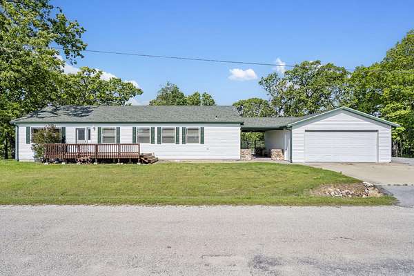1.55 Acres of Land with Home for Sale in Shell Knob, Missouri
