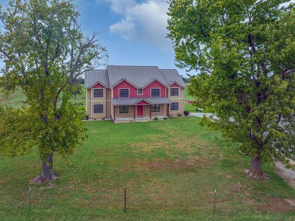 70 Acres of Recreational Land with Home for Sale in Wheatland, Missouri