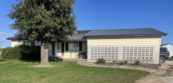 4.46 Acres of Land with Home for Sale in Stark City, Missouri