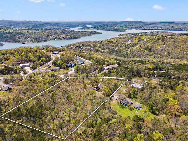 2.79 Acres of Land with Home for Sale in Lampe, Missouri