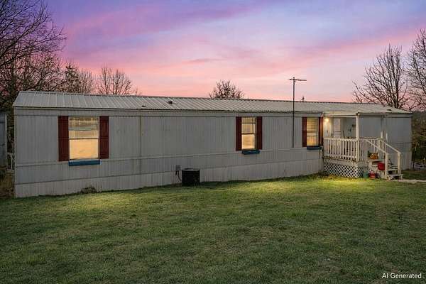 7.4 Acres of Land with Home for Sale in Galena, Missouri