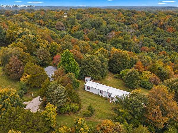 7.4 Acres of Land with Home for Sale in Galena, Missouri