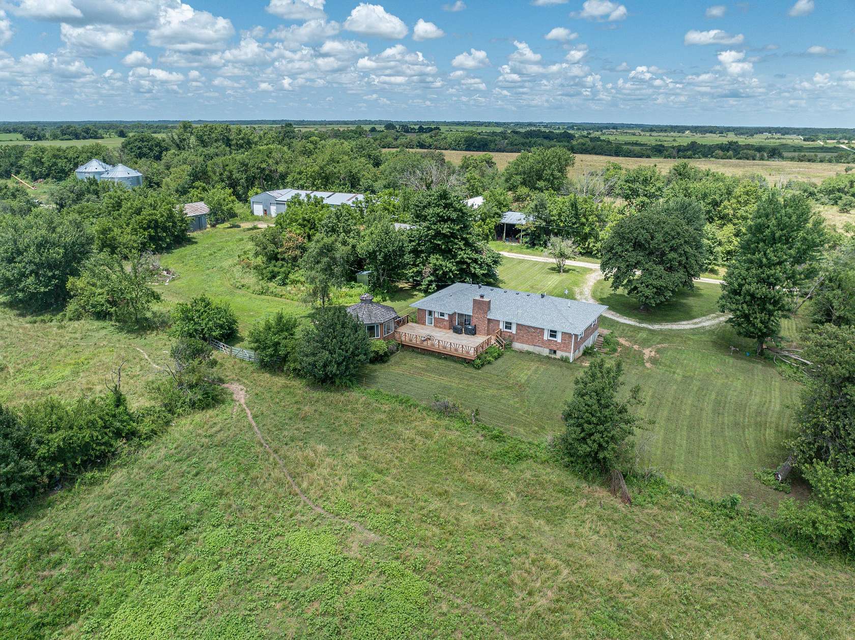 280 Acres of Agricultural Land with Home for Sale in Lockwood, Missouri
