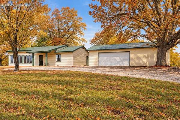 3.5 Acres of Land with Home for Sale in Reeds Spring, Missouri