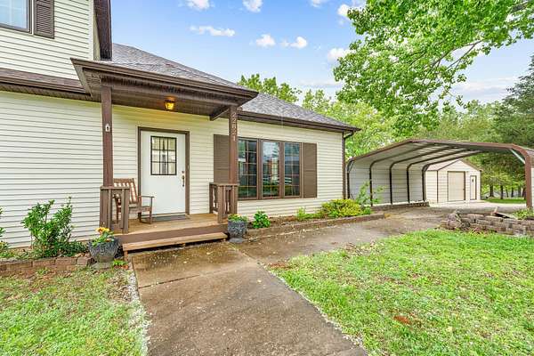 1.5 Acres of Land with Home for Sale in Shell Knob, Missouri