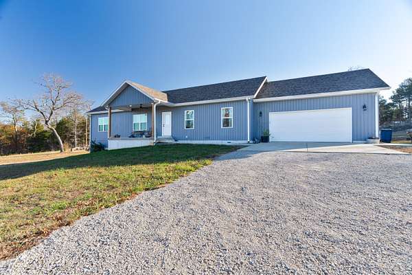 5 Acres of Land with Home for Sale in Kissee Mills, Missouri
