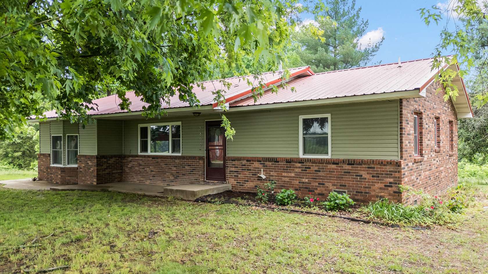 16.1 Acres of Land with Home for Sale in Exeter, Missouri