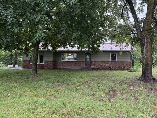 16.1 Acres of Land with Home for Sale in Exeter, Missouri