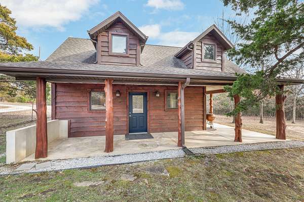 18.4 Acres of Land with Home for Sale in Protem, Missouri