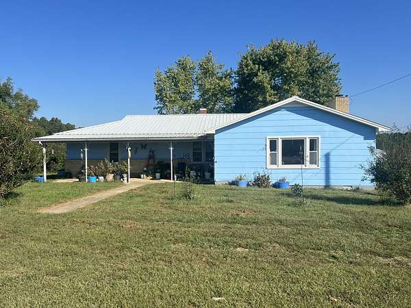 39.4 Acres of Land with Home for Sale in Birch Tree, Missouri