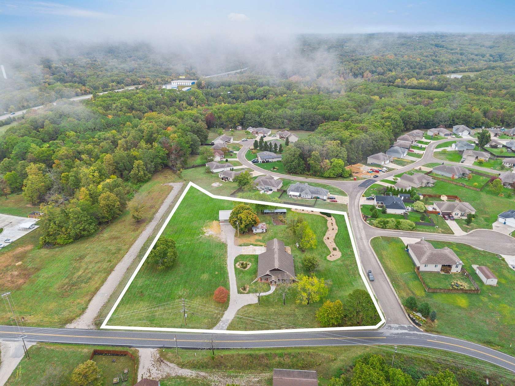 2.4 Acres of Land with Home for Sale in Reeds Spring, Missouri