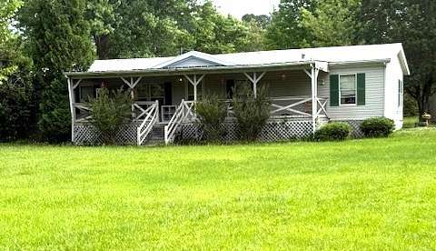 1.5 Acres of Land with Home for Auction in Manchester, Tennessee