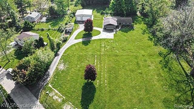 1.73 Acres of Land with Home for Sale in White Lake, Michigan