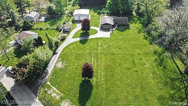 1.73 Acres of Land with Home for Sale in White Lake, Michigan