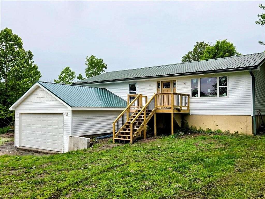 18 Acres of Land with Home for Sale in Holden, Missouri