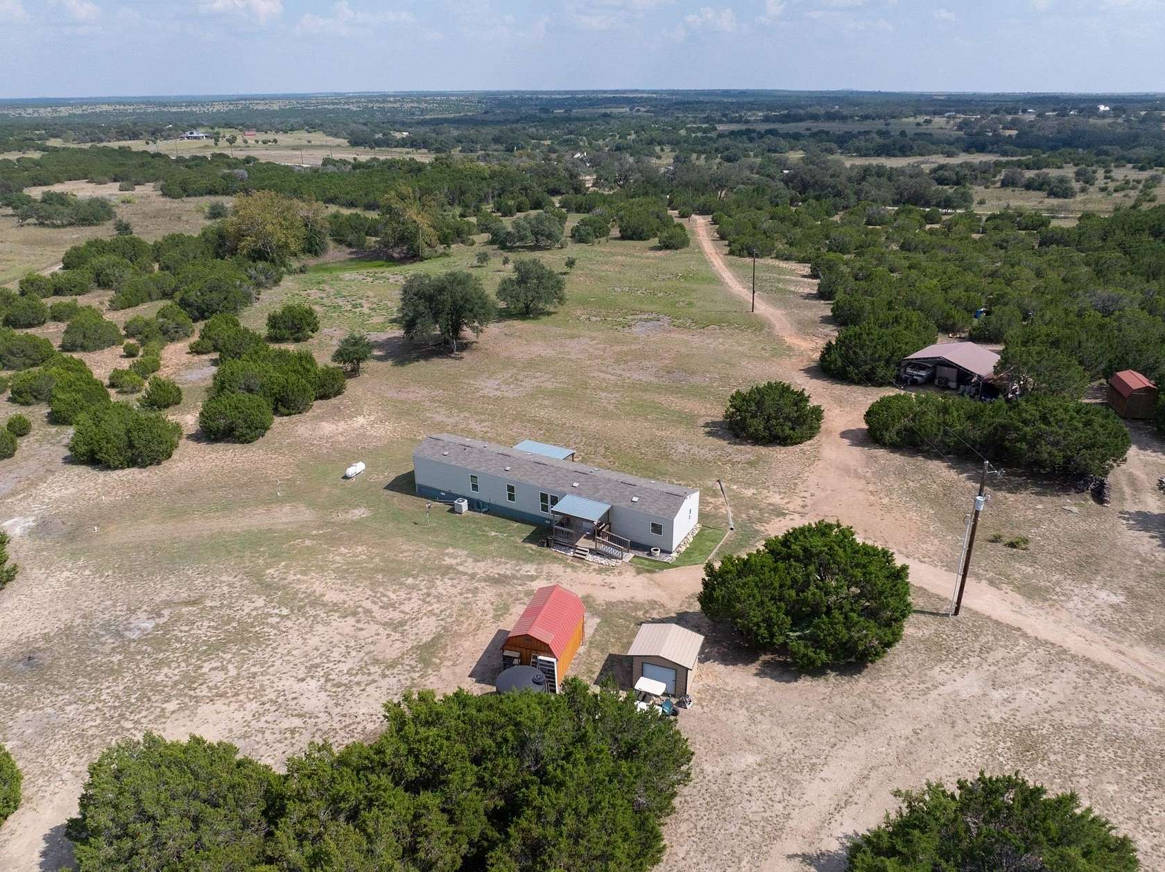 16.3 Acres of Land with Home for Sale in Bertram, Texas