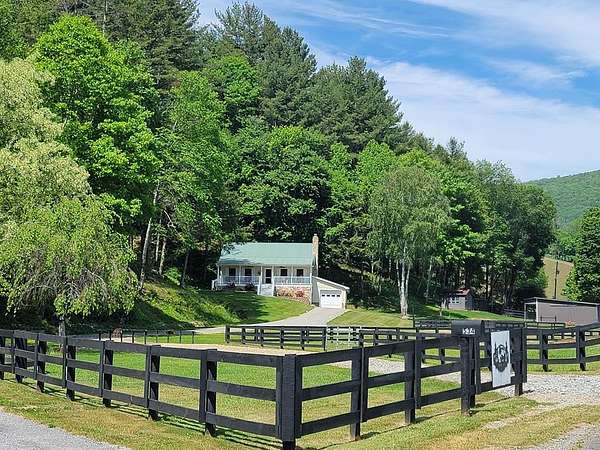 5.2 Acres of Land with Home for Sale in Mouth of Wilson, Virginia