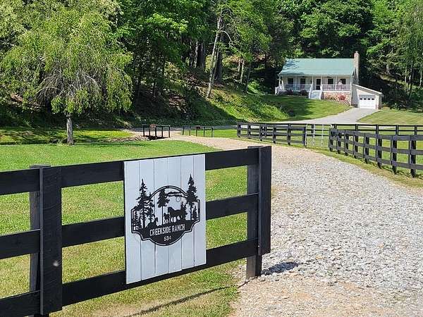 5.2 Acres of Land with Home for Sale in Mouth of Wilson, Virginia