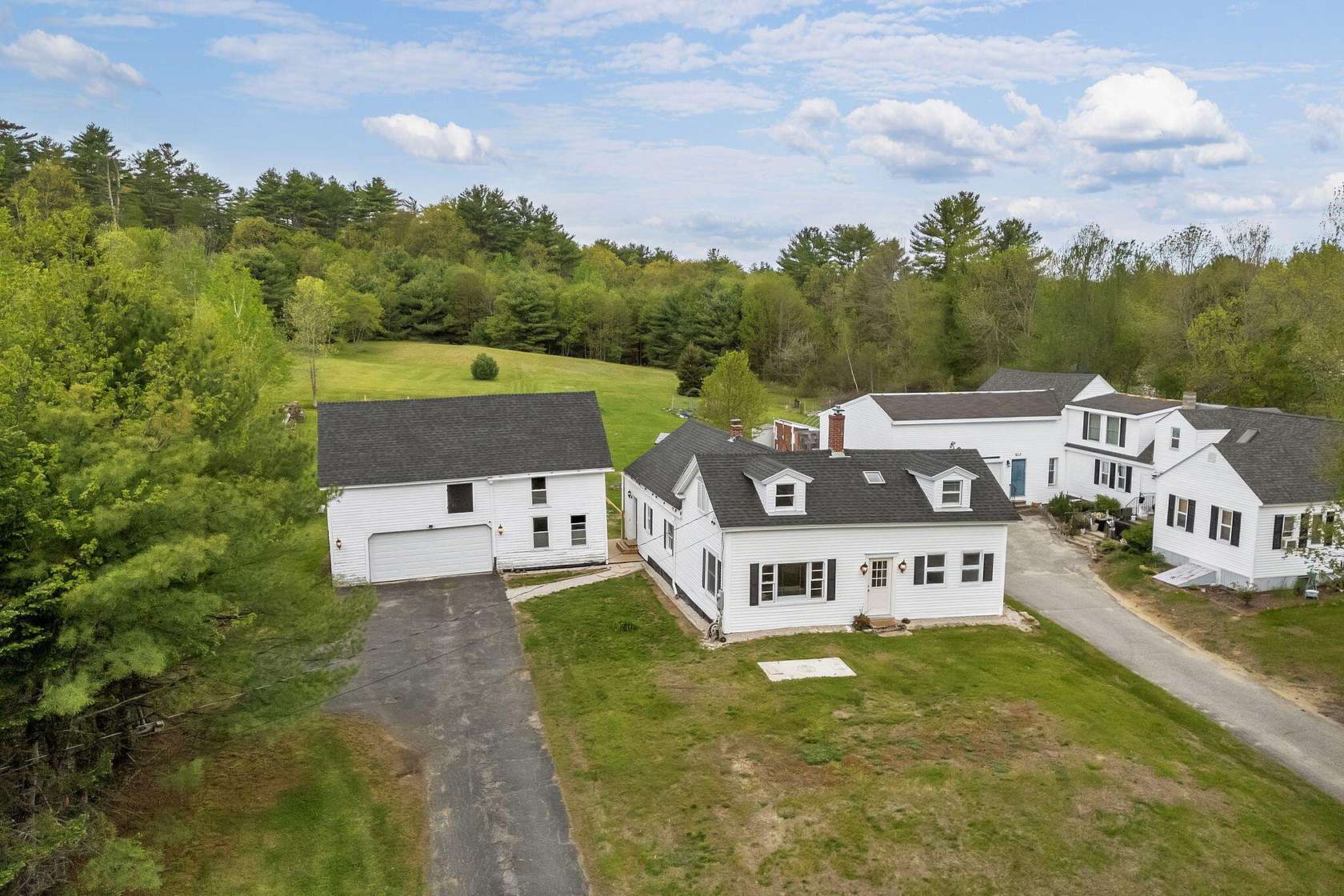 3.88 Acres of Land with Home for Sale in Poland, Maine