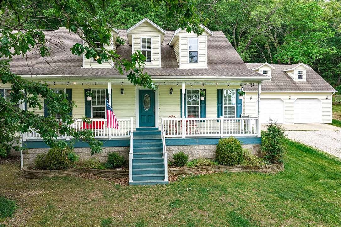 13.1 Acres of Land with Home for Sale in Berryville, Arkansas