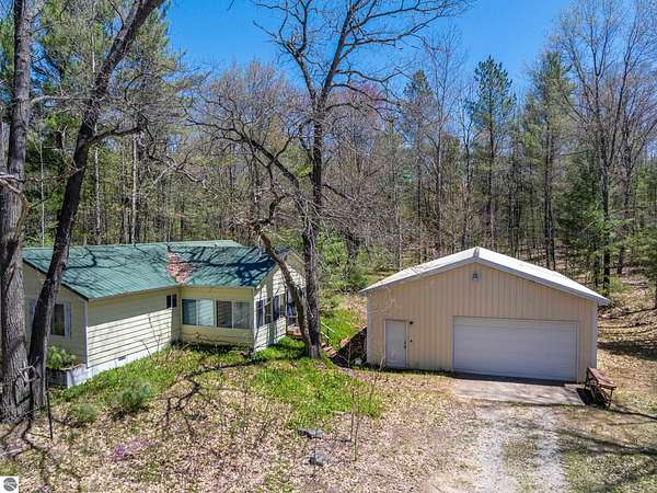 2.46 Acres of Land with Home for Sale in Kalkaska, Michigan