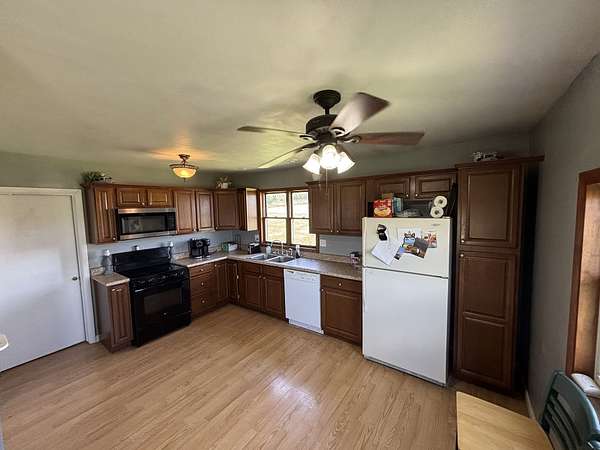 61 Acres of Land with Home for Sale in Pleasantville, Iowa