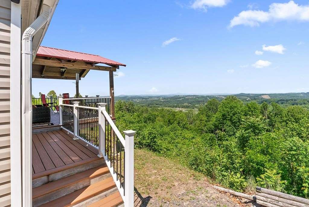 5.6 Acres of Land with Home for Sale in Fancy Gap, Virginia