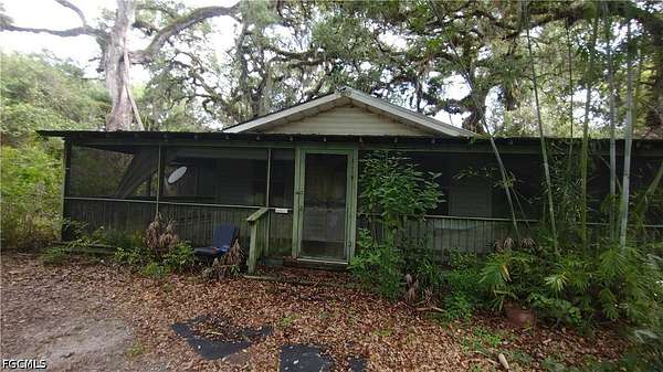 5.35 Acres of Land with Home for Sale in Moore Haven, Florida