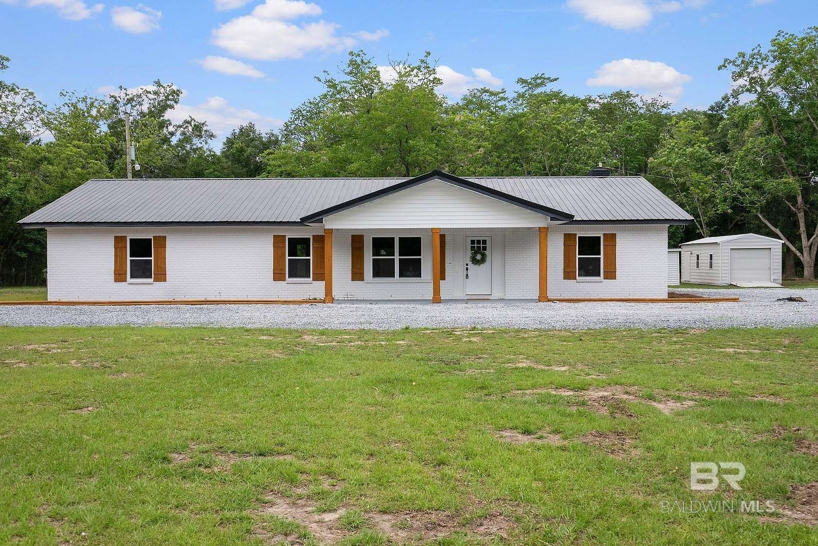 2.39 Acres of Land with Home for Sale in Elberta, Alabama