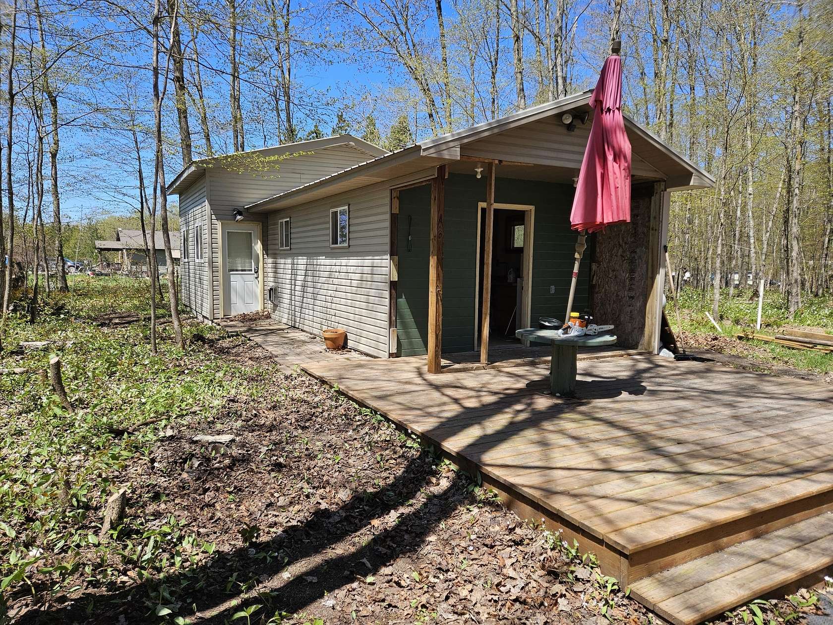 2.5 Acres of Land with Home for Sale in Curtis, Michigan