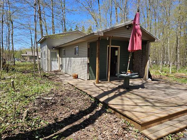 2.5 Acres of Land with Home for Sale in Curtis, Michigan