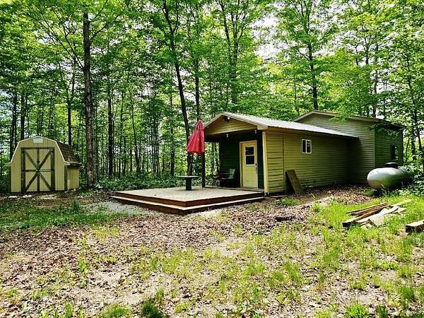2.5 Acres of Land with Home for Sale in Curtis, Michigan