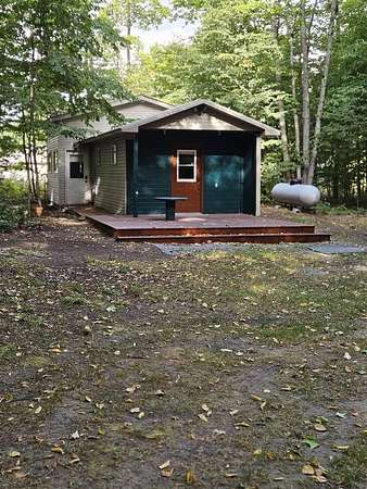 2.5 Acres of Land with Home for Sale in Curtis, Michigan