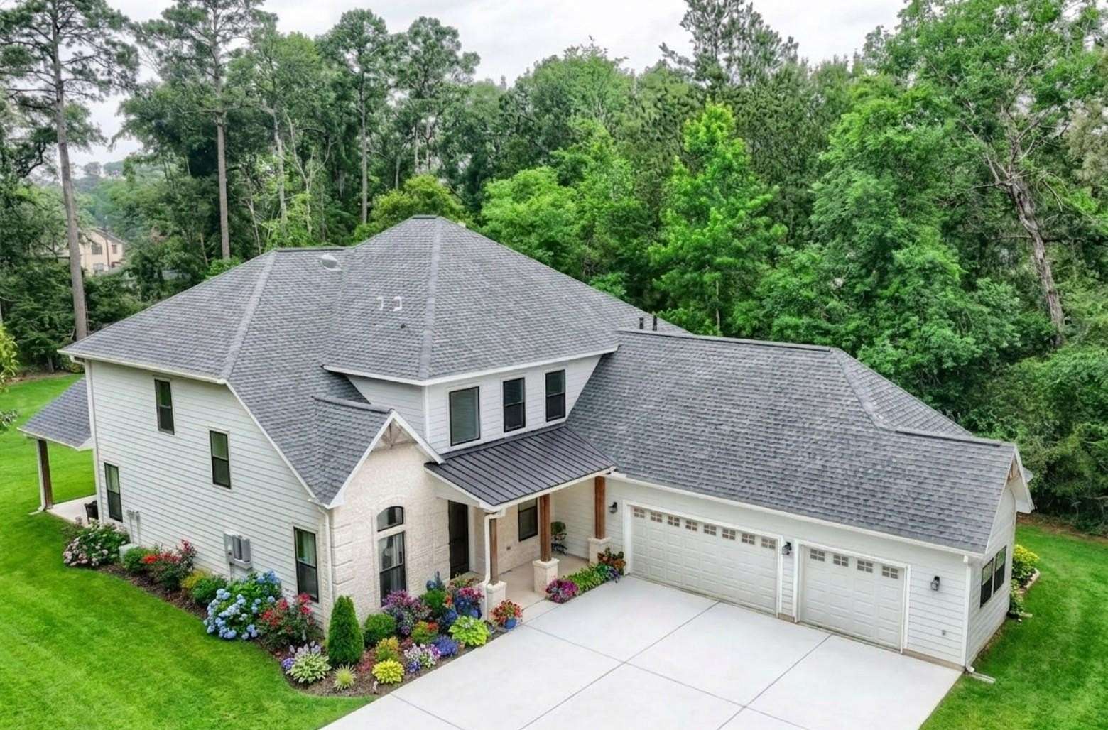 1.6 Acres of Land with Home for Sale in Conroe, Texas