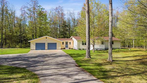 7 Acres of Land with Home for Sale in Cheboygan, Michigan