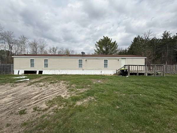 1.5 Acres of Land with Home for Sale in Rhodes, Michigan
