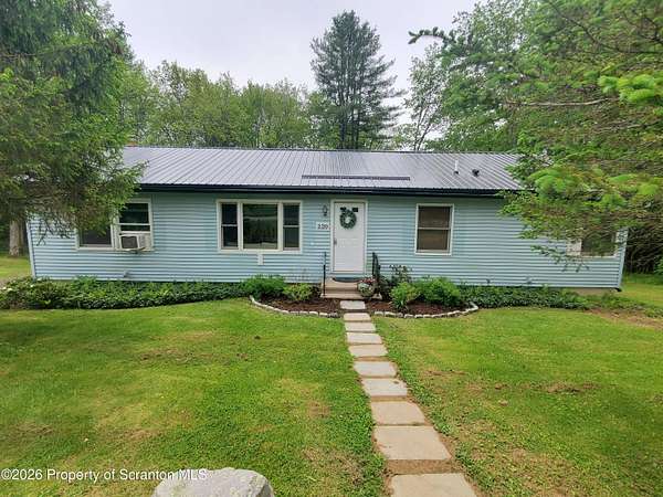 12.8 Acres of Land with Home for Sale in Brackney, Pennsylvania