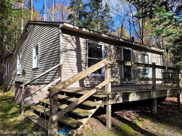 20 Acres of Recreational Land with Home for Sale in Whittemore, Michigan