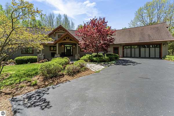 29.2 Acres of Recreational Land with Home for Sale in Onekama, Michigan