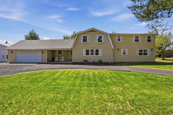9.85 Acres of Land with Home for Sale in Colbert, Washington