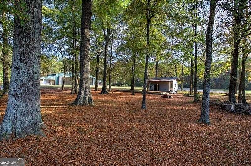 55.4 Acres of Land with Home for Sale in Rockmart, Georgia