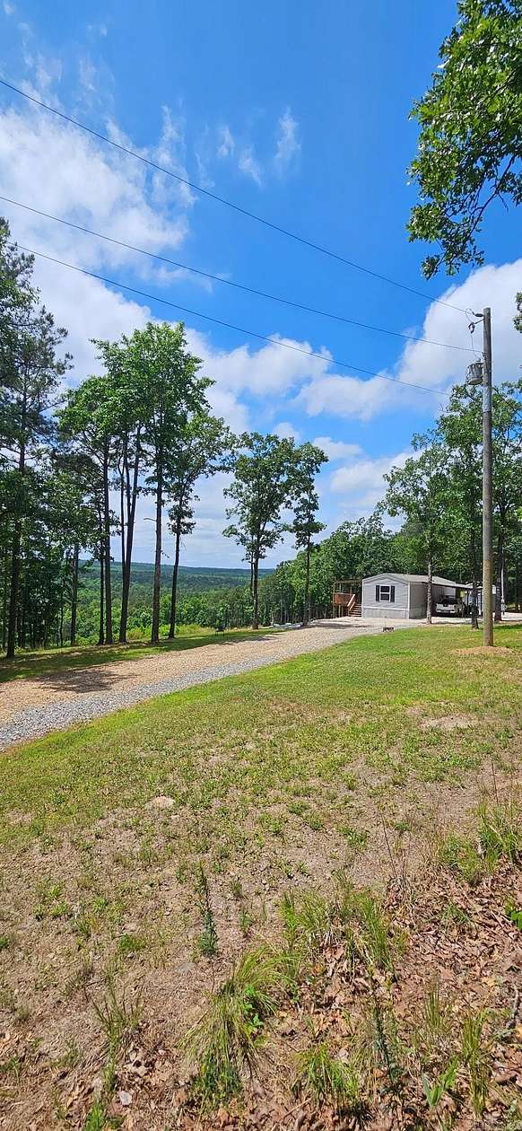 15.4 Acres of Recreational Land with Home for Sale in Bigelow, Arkansas