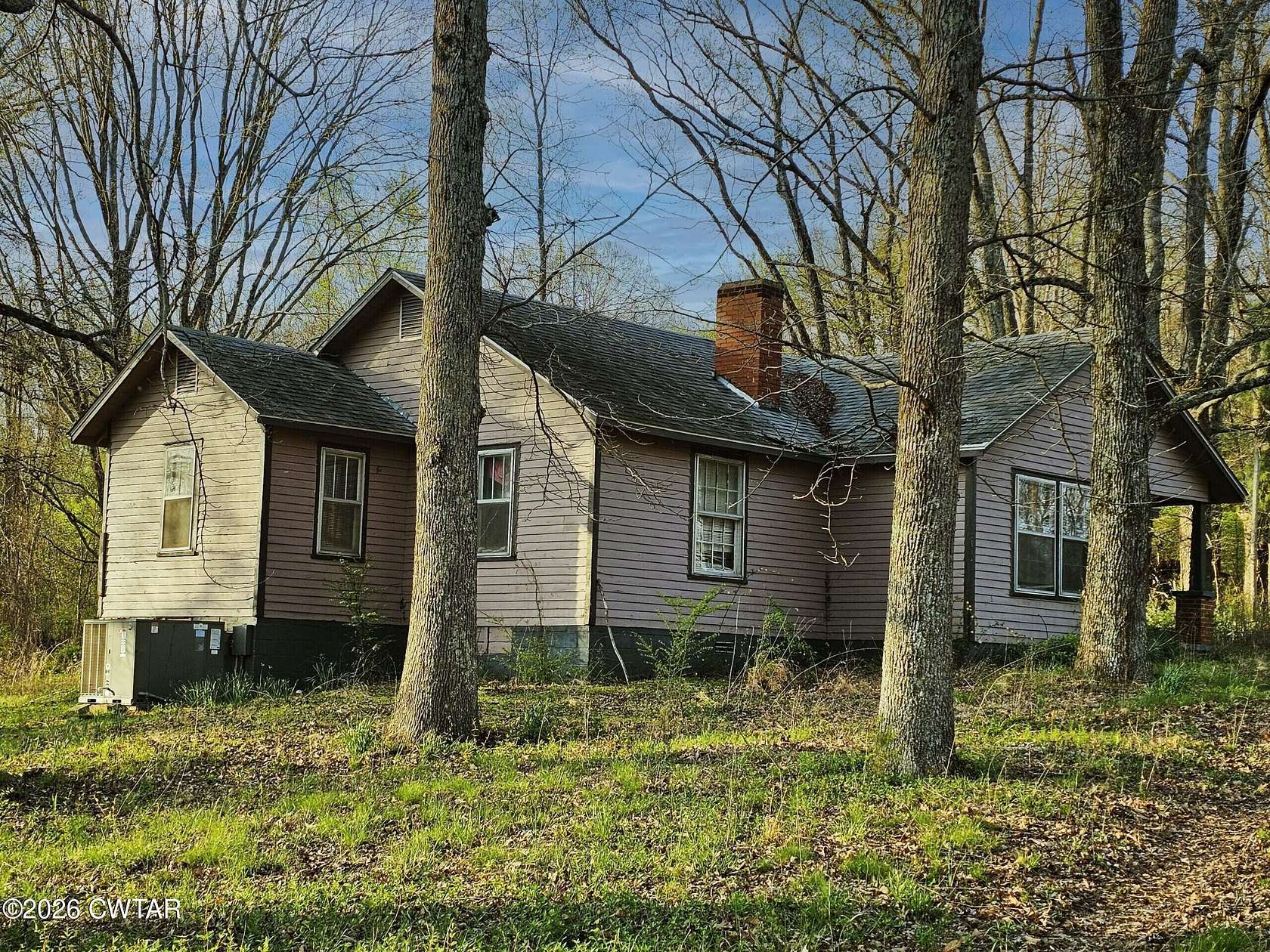 2.29 Acres of Land with Home for Sale in Hollow Rock, Tennessee
