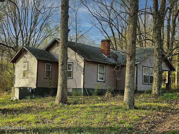 2.29 Acres of Land with Home for Sale in Hollow Rock, Tennessee