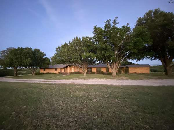 9.9 Acres of Land with Home for Sale in Scotland, Texas